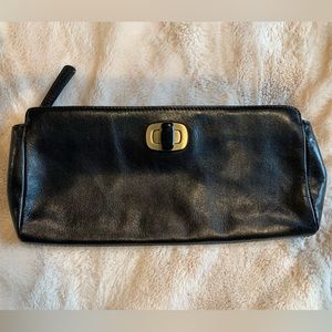 HOBO black leather turn lock clutch with red lining